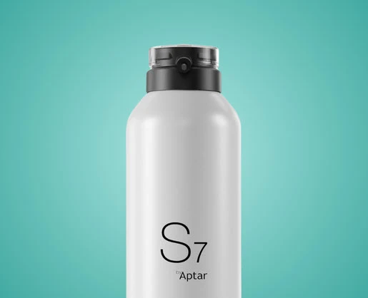 A sleek white bottle with a black ergonomic aerosol actuator, labeled S7 by Aptar, is set against a solid turquoise background.