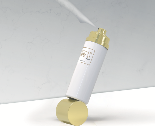 A white and gold bottle with premium aerosol packaging labeled All Over Spray is balanced at an angle on a gold cylindrical stand against a light, marble-patterned background with a spray pattern coming out of the actuator.
