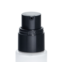 Close-up of a black, reliable cosmetic pump named Evoclassic dispenser atop a clear bottle, ideal for lotions, creams, or liquid skincare products, set against a white background.