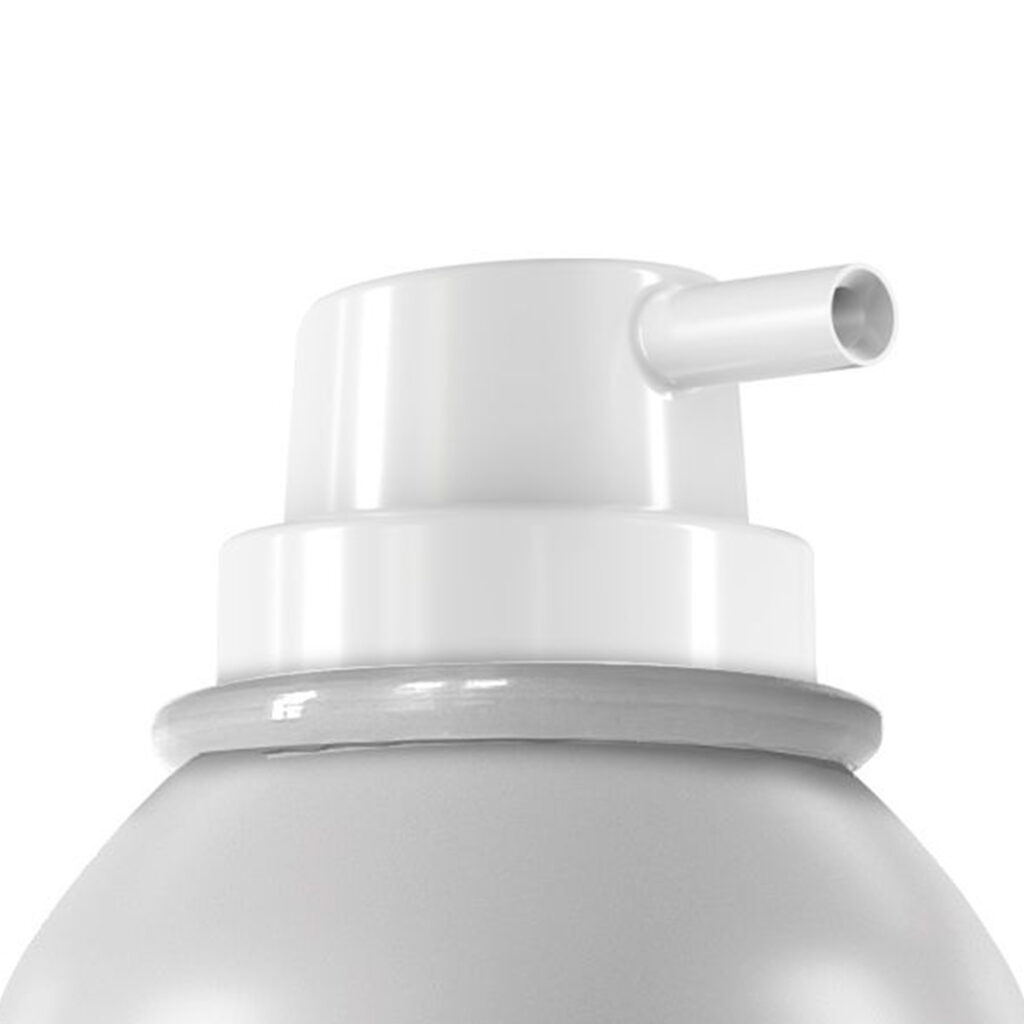Close-up of an aerosol actuator with extended nozzle labeled CAR, featuring a white plastic cap and small protruding spout, shown against a plain white background.