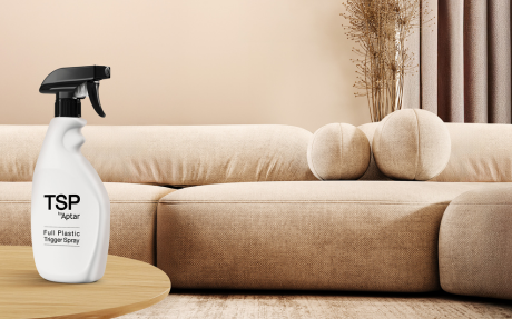 TSP Trigger Spray Pump full plastic Packaging in black and white on a coffee table in a living room environment