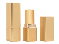 Two gold rectangular lipstick tubes are displayed: one closed, one open with the cap placed beside it. The sleek, metallic design highlights premium lipstick packaging.