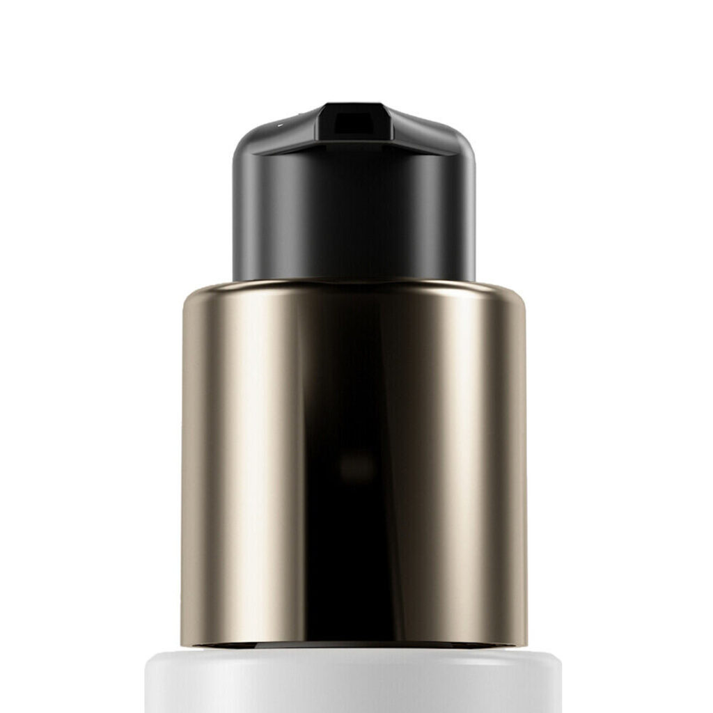 Close-up of a high performing twist-to-lock pump named PZ Lark treatment pump with a black top and metallic gold collar, attached to a white bottle, set against a plain white background.